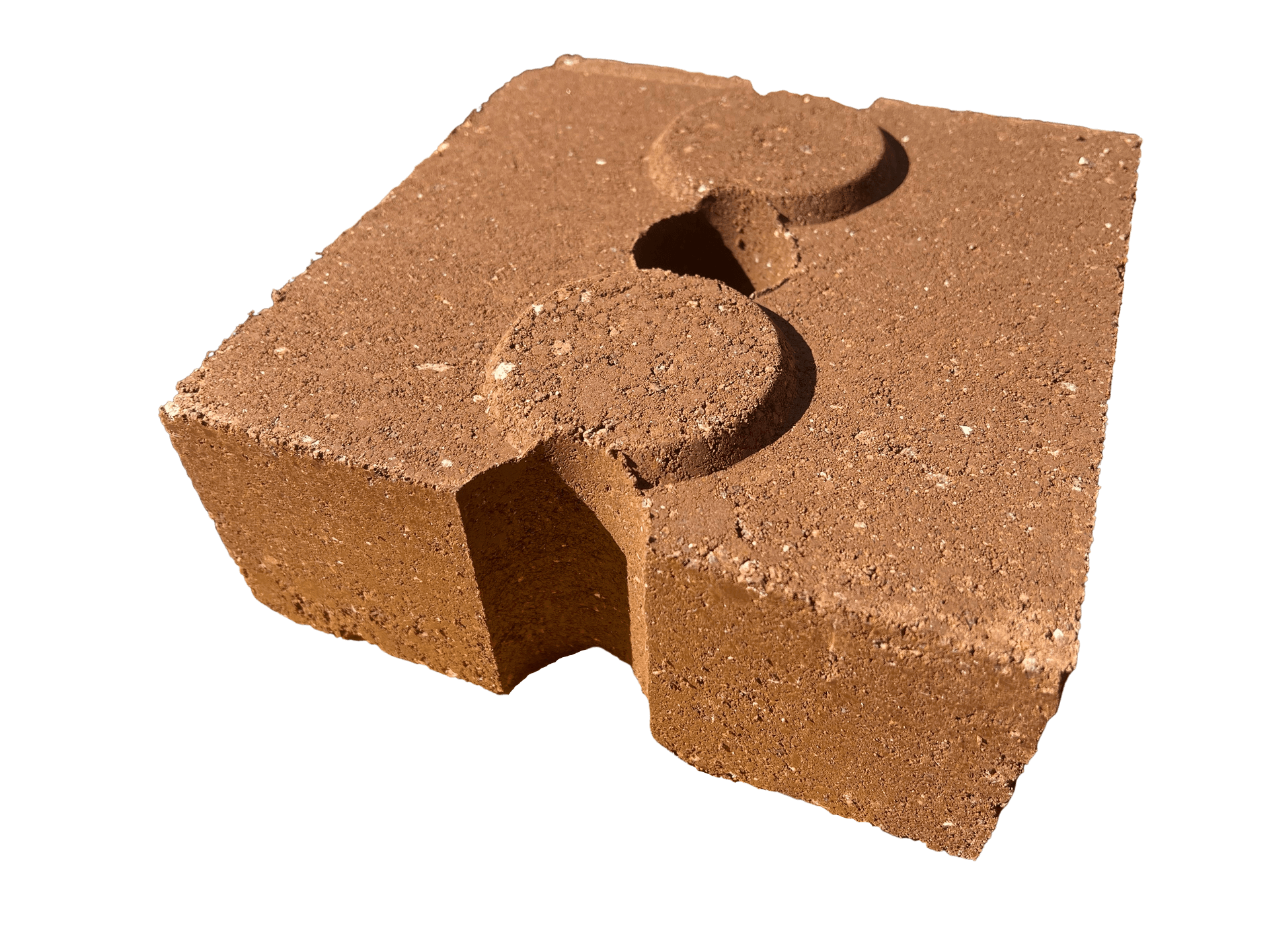 Compressed Earth Block, with holes for rebar and interlock keys